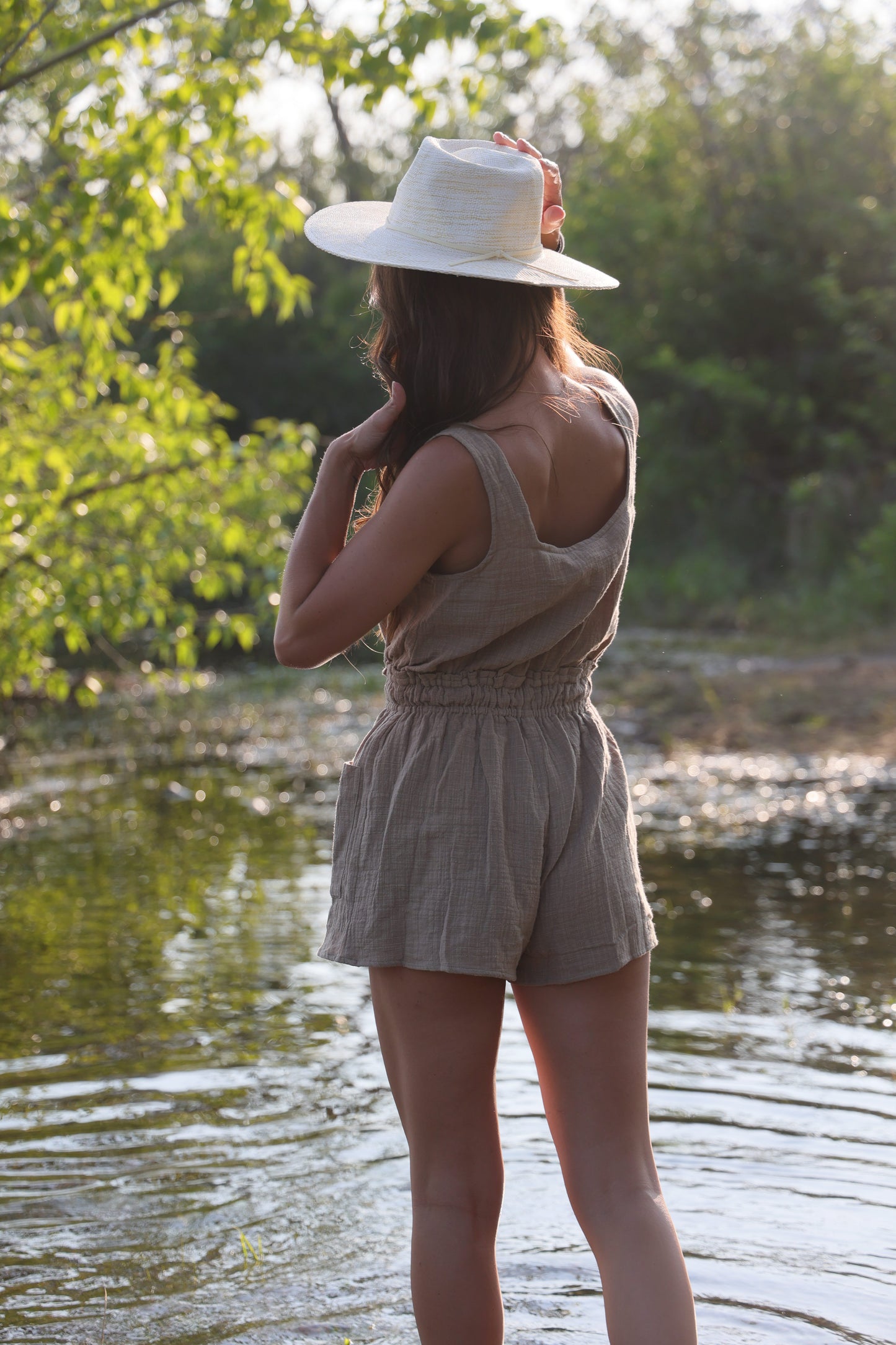 OAKLYNN WOVEN SLEEVELESS BUTTON DRAWSTRING ROMPER