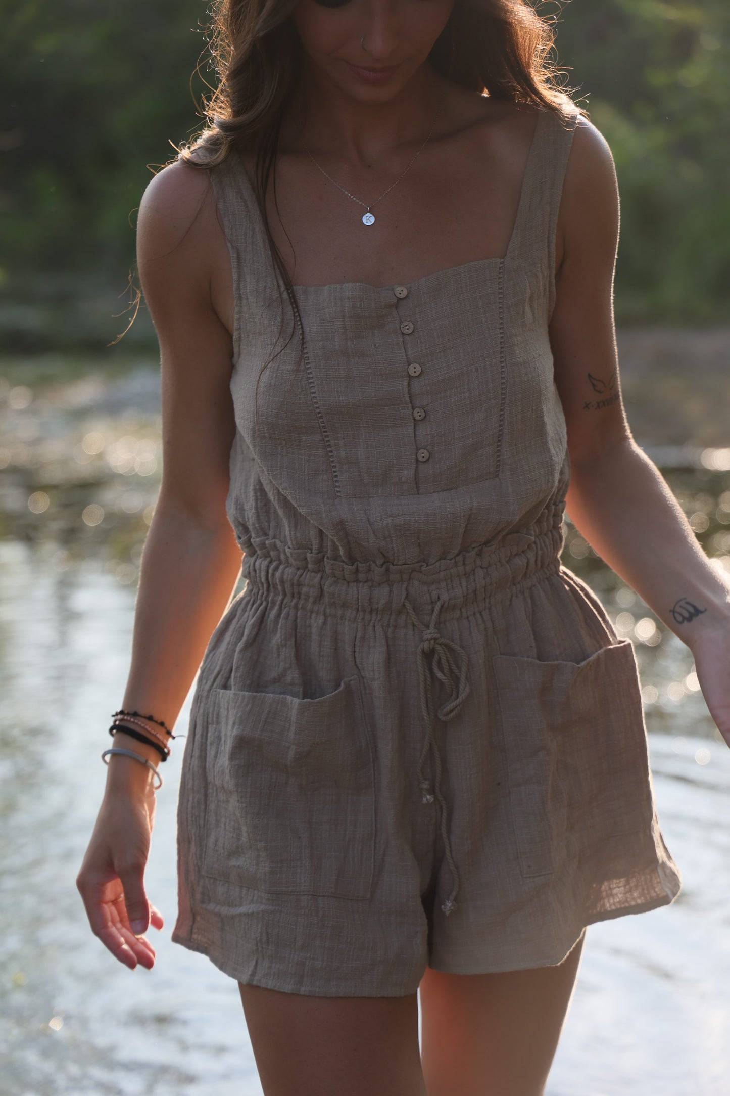 OAKLYNN WOVEN SLEEVELESS BUTTON DRAWSTRING ROMPER